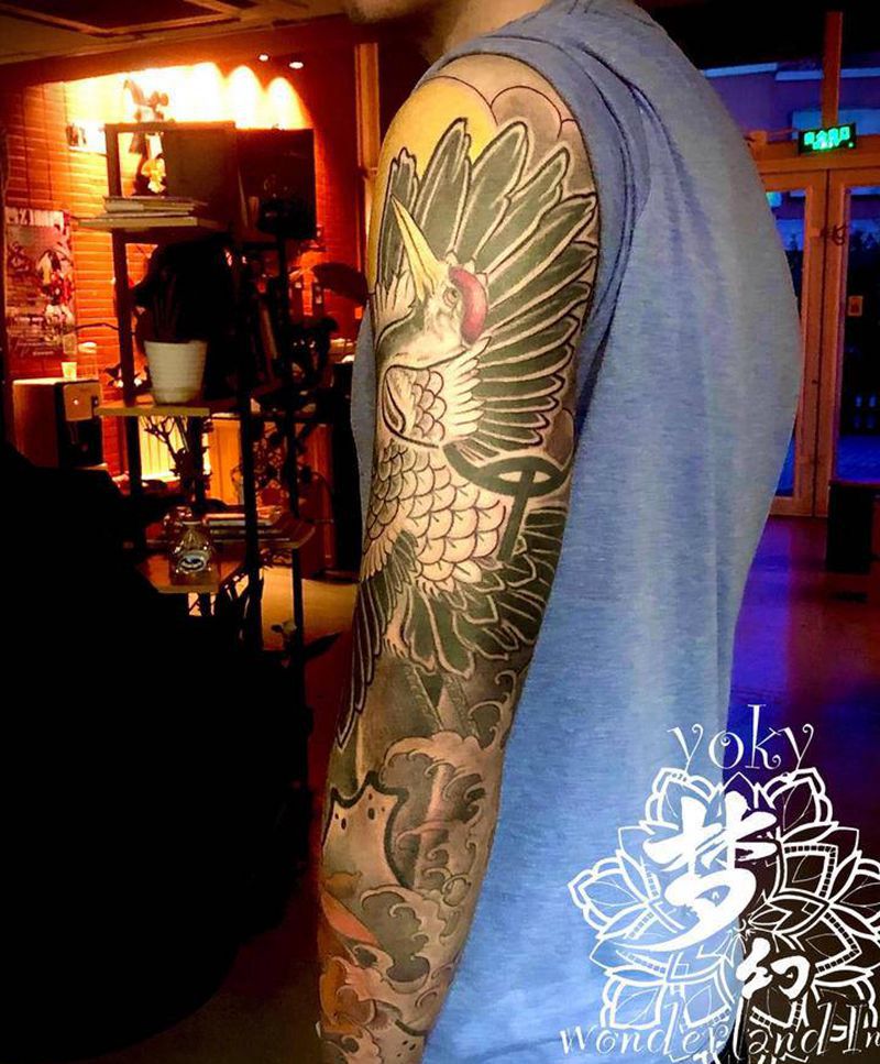 鹤与兔纹身图片_手臂新传统纹身图案