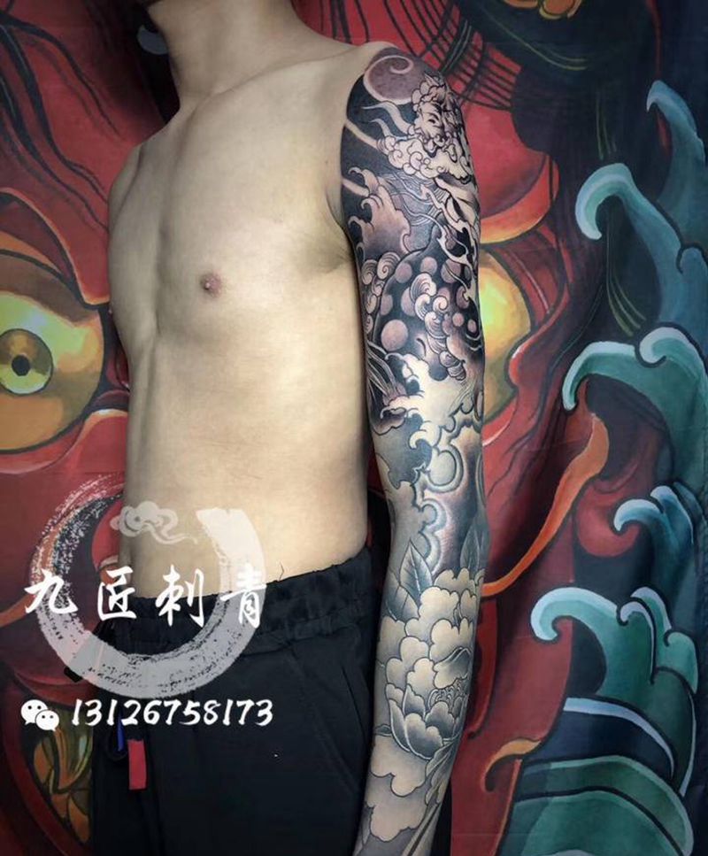 唐狮花臂纹身图片_手臂手部新传统唐狮 牡丹纹身图案