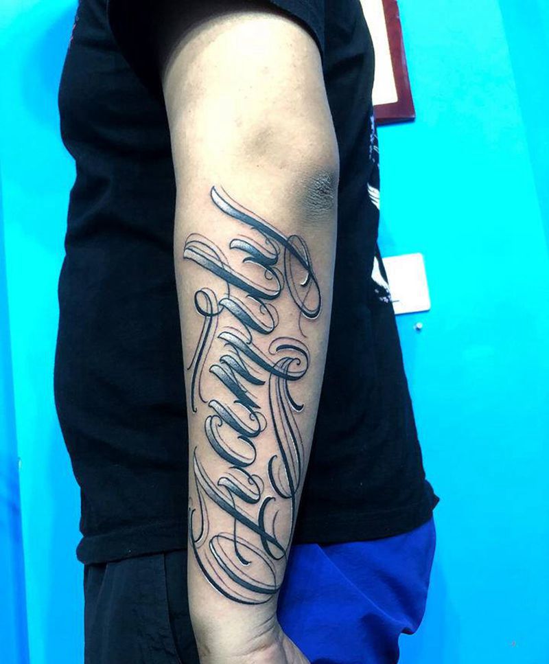 花体字纹身图片_手臂花体字纹身图案