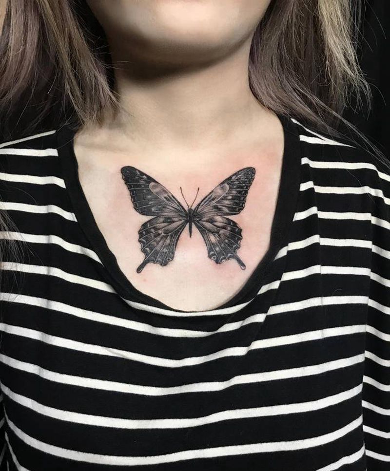 发福蝶纹身图片_胸部欧美写实纹身图案