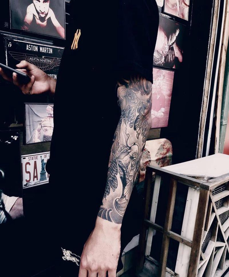 接花臂纹身图片_手臂老传统纹身图案