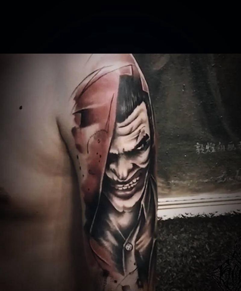 小丑纹身图片_手臂欧美写实New School纹身图案