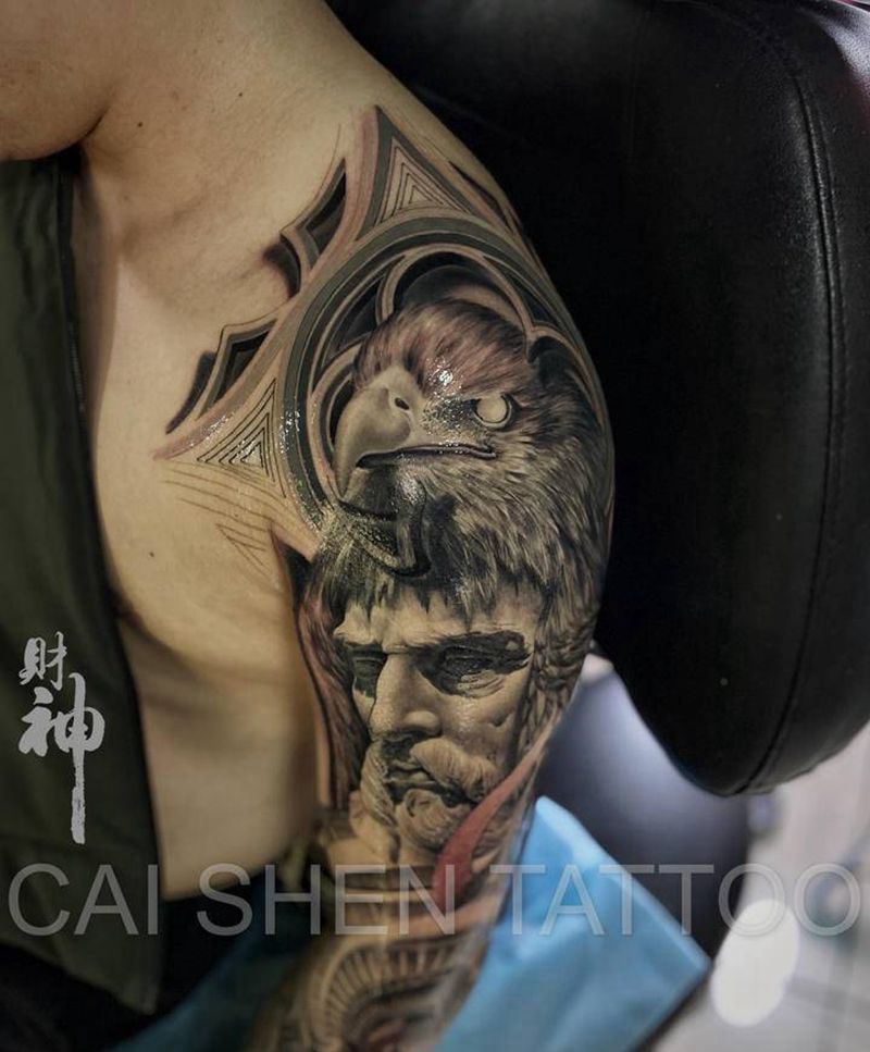 花臂纹身图片_手臂欧美写实老鹰窗花波塞冬纹身图案