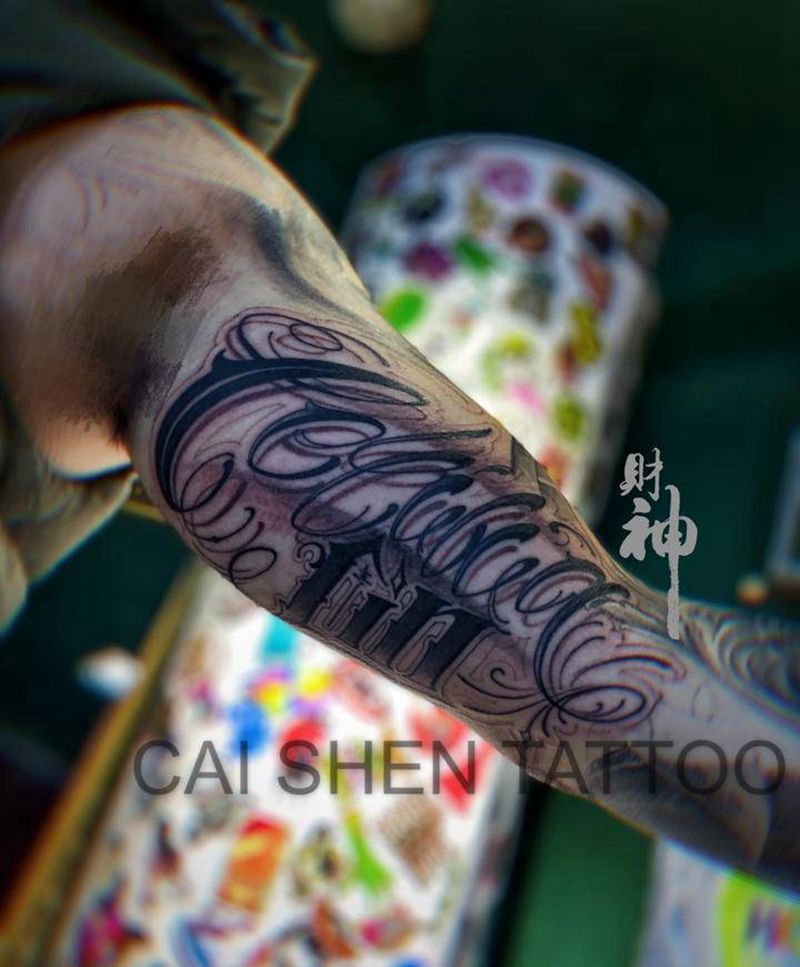 家纹身图片_手臂花体字纹身图案