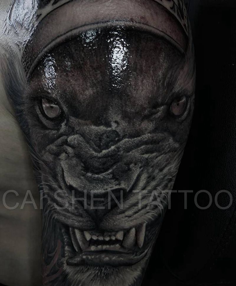 狮子未完纹身图片_手臂欧美写实纹身图案