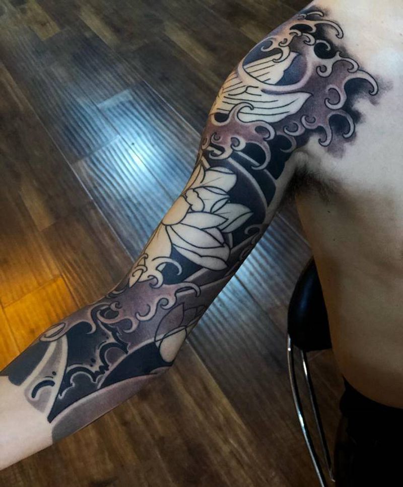 七分花臂未完纹身图片_手臂老传统新传统纹身图案