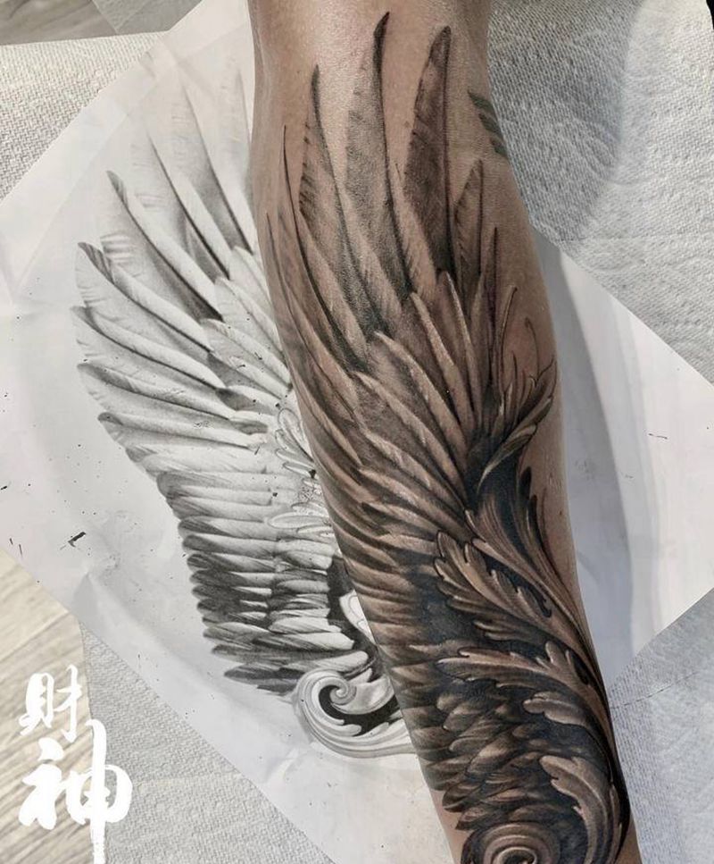 翅膀纹身图片_手臂欧美写实纹身图案