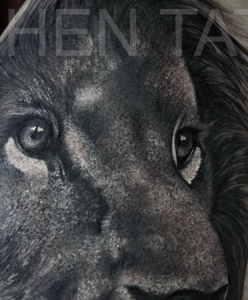 狮子局部纹身图片_手臂欧美写实纹身图案