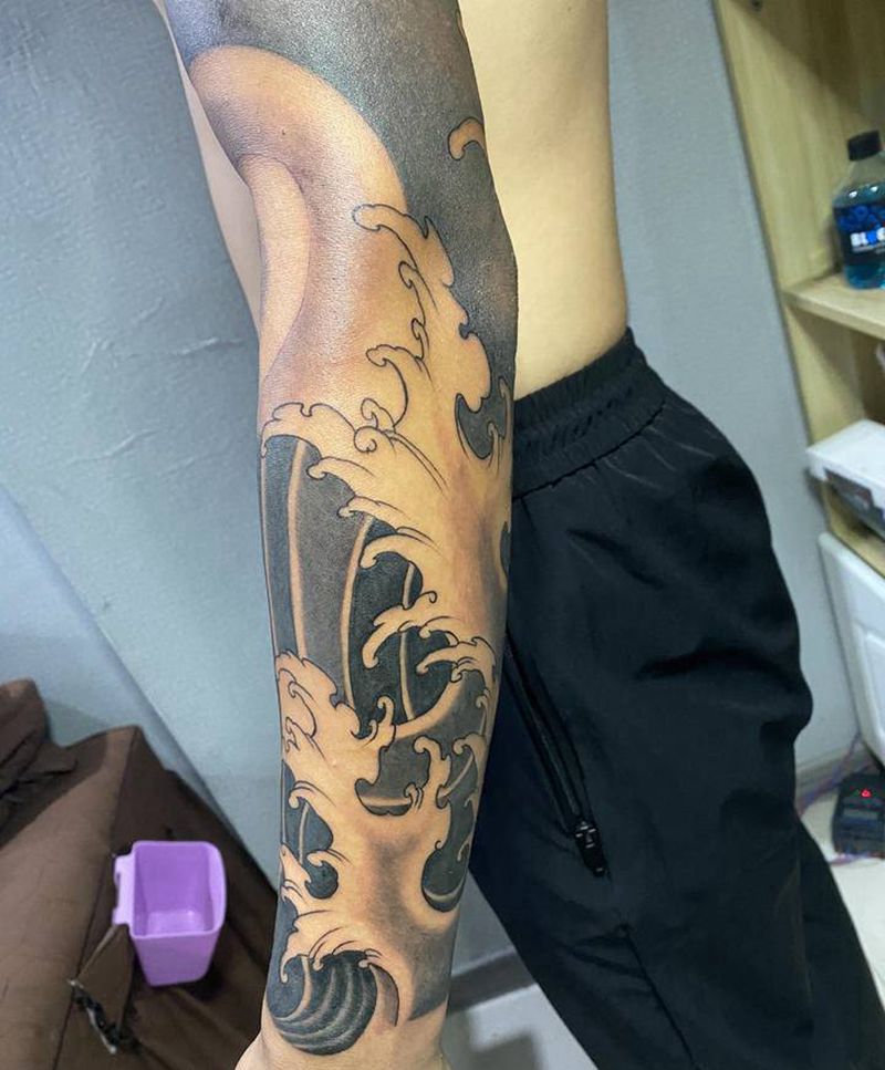 小浪臂遮盖纹身图片_手臂纹身图案