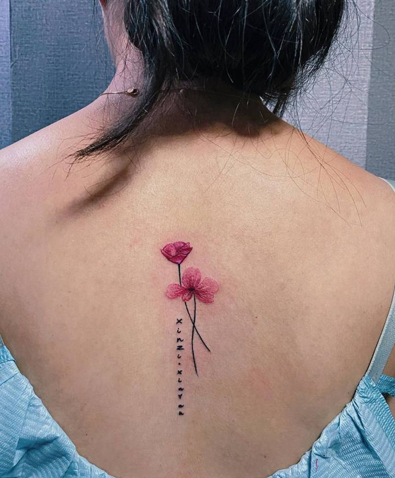 花与孩子名纹身图片_背部纹身图案