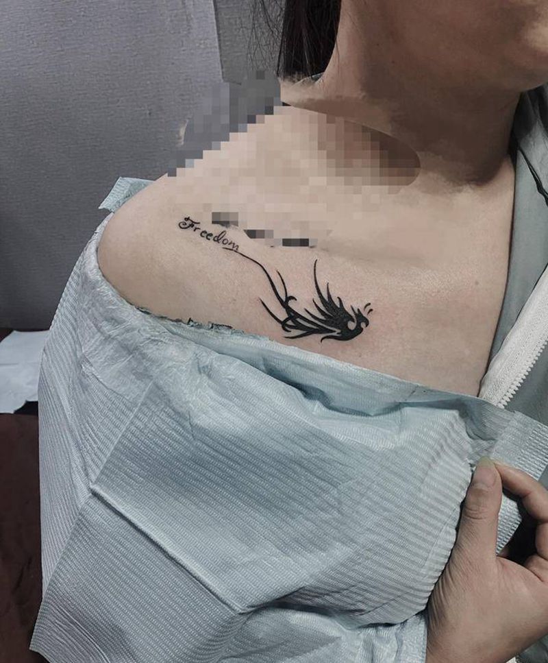 凤凰图腾纹身图片_胸部纹身图案