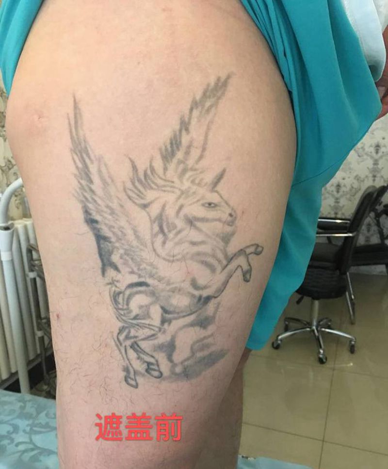 小腿象神完工纹身图片_腿部新传统纹身图案