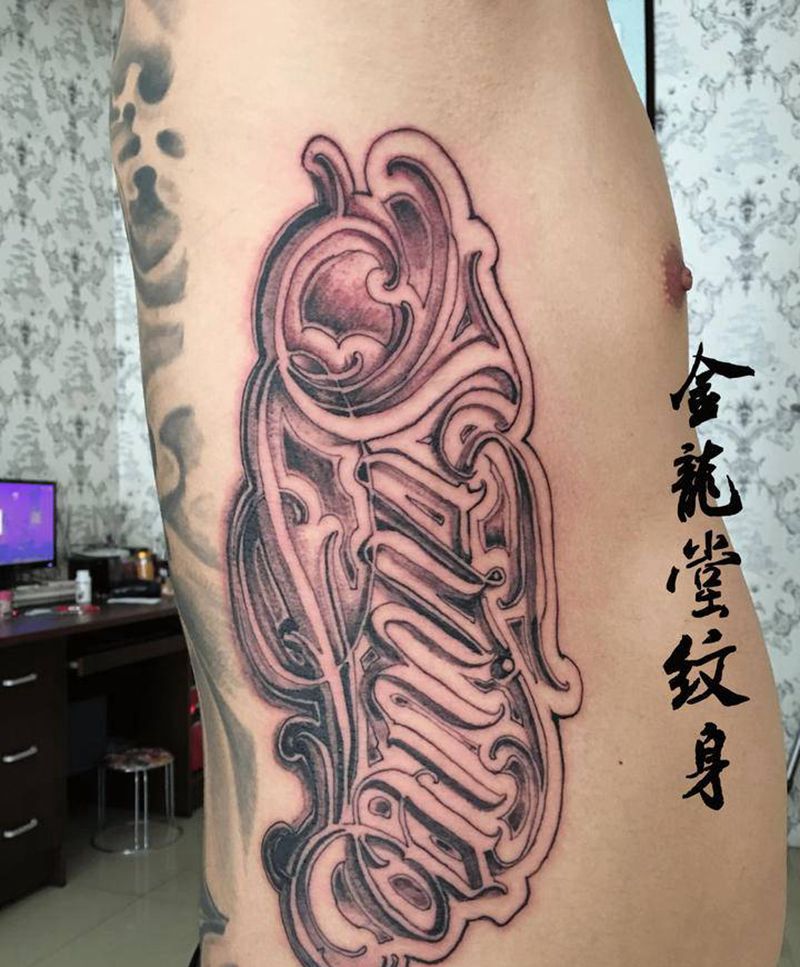 花体英文纹身图片_腰部花体字纹身图案