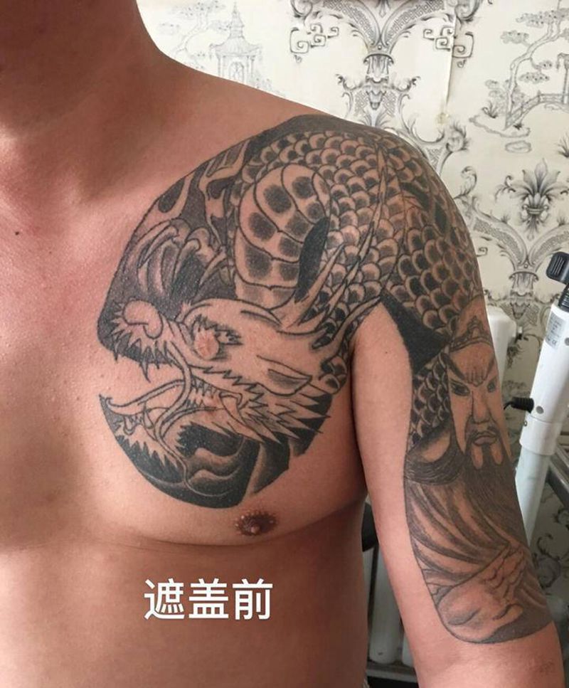修改未完成半胛纹身图片_肩部胸部新传统纹身图案