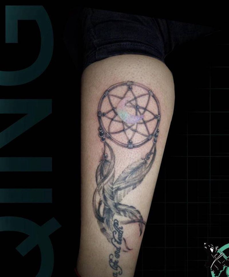 补梦网纹身图片_腿部补梦网纹身图案