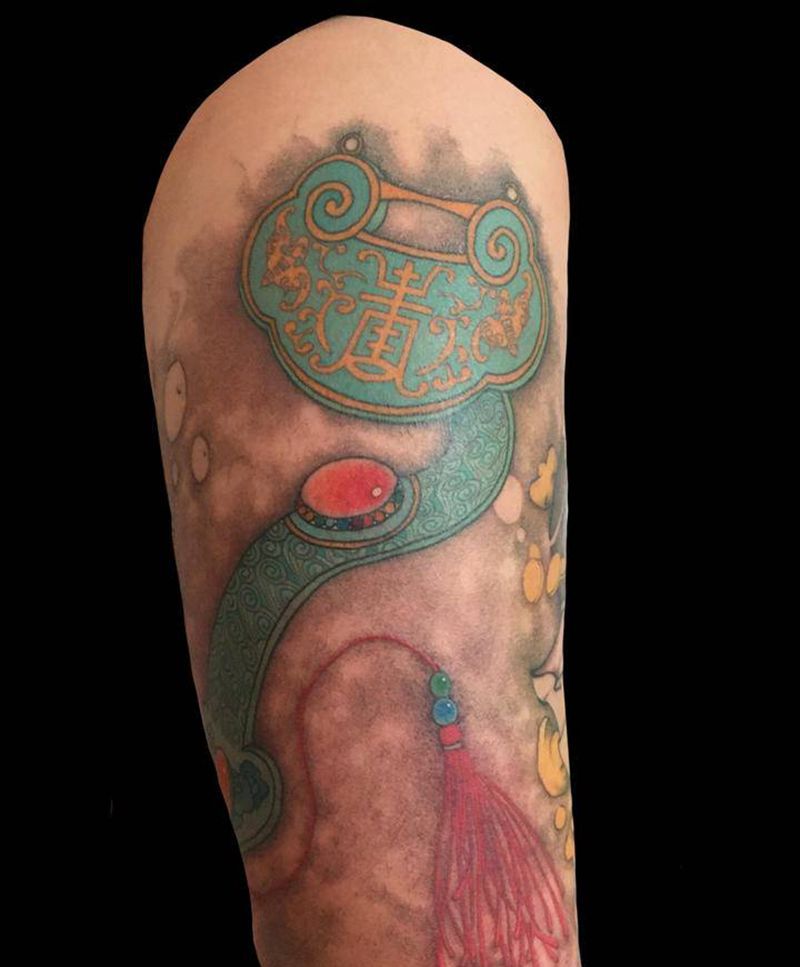 如意如意纹身图片_腰部新传统如意钱袋纹身图案