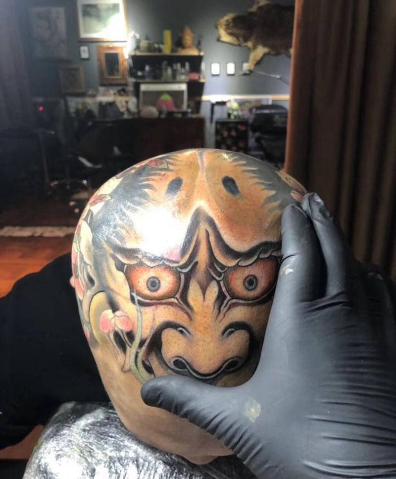 般若纹身图片_新传统头部纹身图案