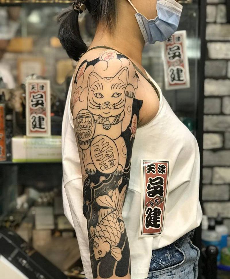 招财猫千两万两纹身图片_手臂老传统纹身图案
