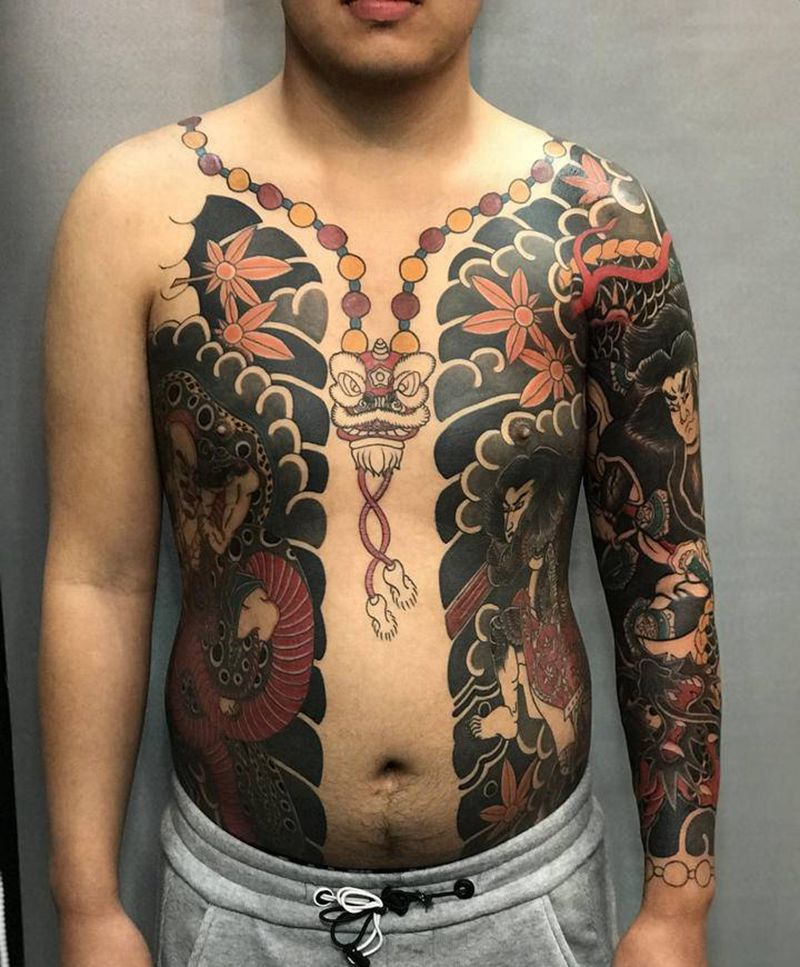 通体完成百分之六十纹身图片_胸部手部老传统纹身图案