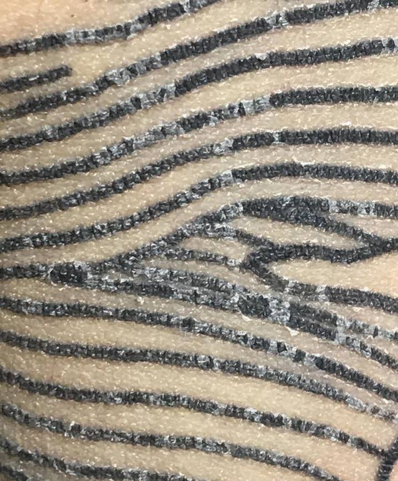 线条纹身图片_手臂老传统纹身图案