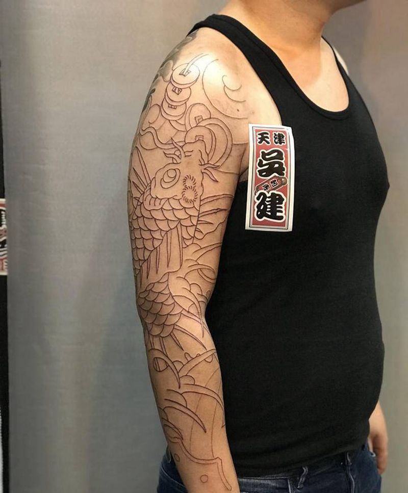 花臂鱼纹身图片_手臂老传统纹身图案