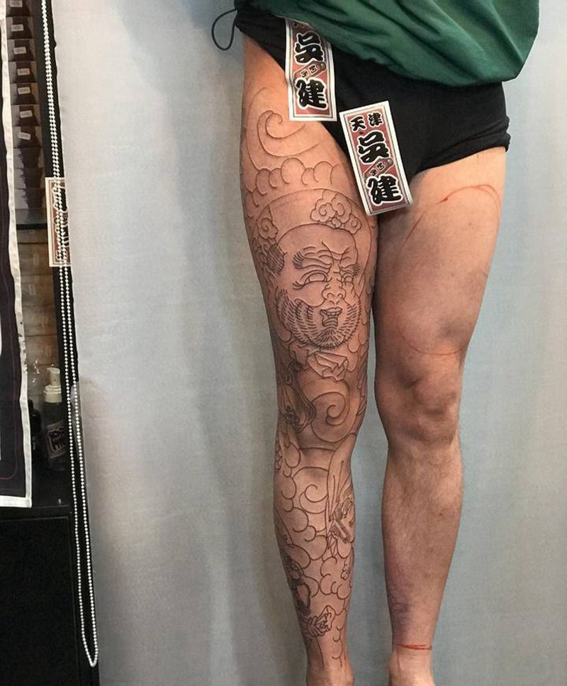 满背接花腿纹身图片_腿部老传统纹身图案