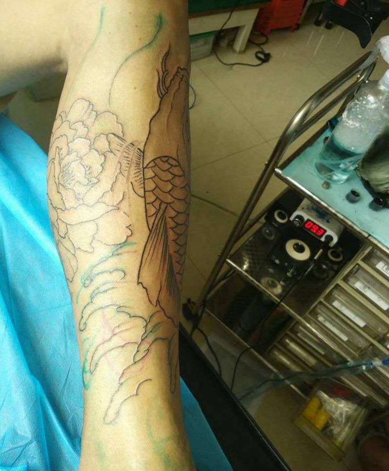 鲤鱼包小腿 未完成纹身图片_