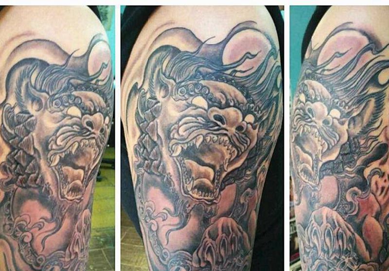 唐狮纹身图片_手臂传统动物宗教成品纹身图案