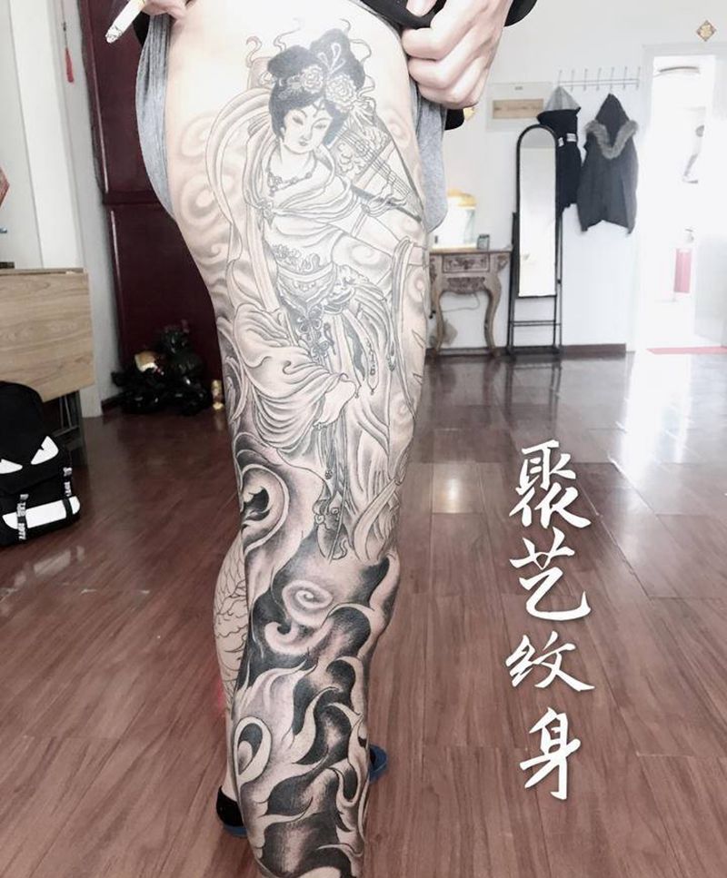 反弹琵琶凤来戏纹身图片_腿部新传统纹身图案
