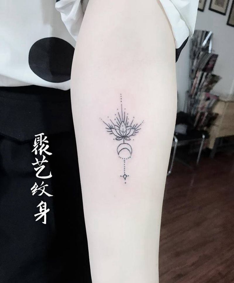 点线莲花纹身图片_手臂纹身图案