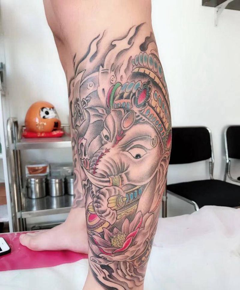 包腿象神纹身图片_腿部纹身图案