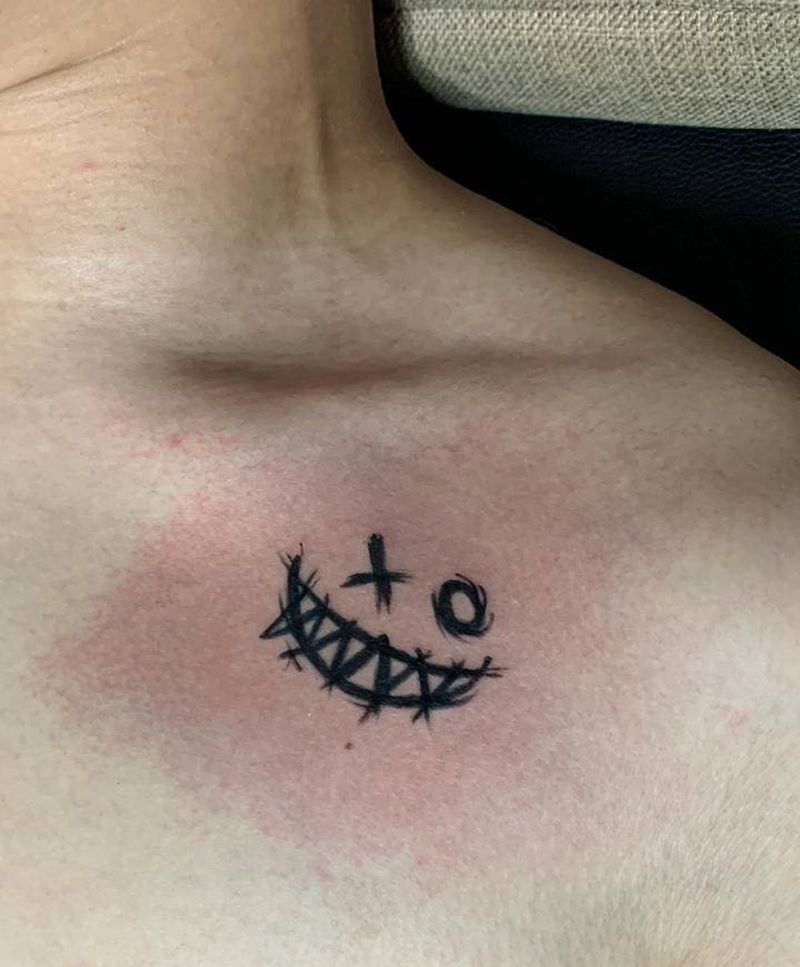 特价小图纹身图片_胸部纹身图案