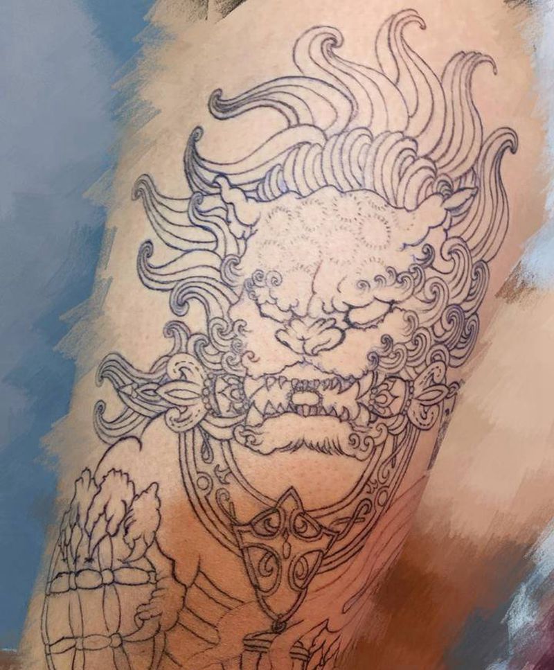 大腿唐狮子割线纹身图片_腿部新传统纹身图案