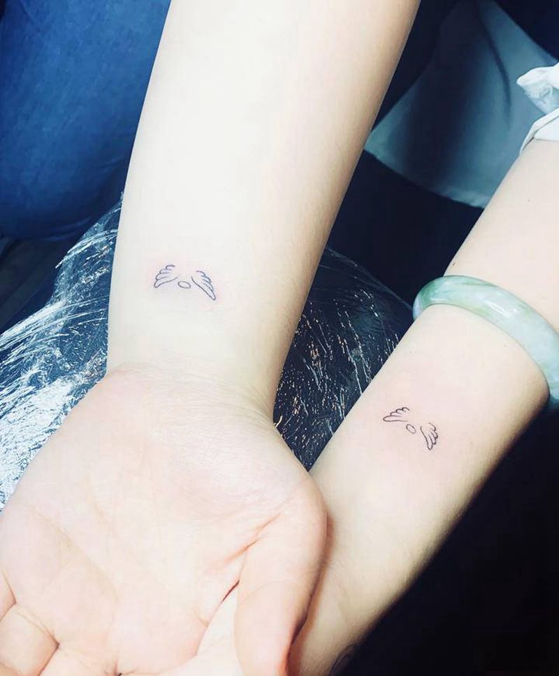 闺蜜纹身小翅膀纹身图片_手臂臀部几何小清新翅膀闺蜜纹身纹身图案