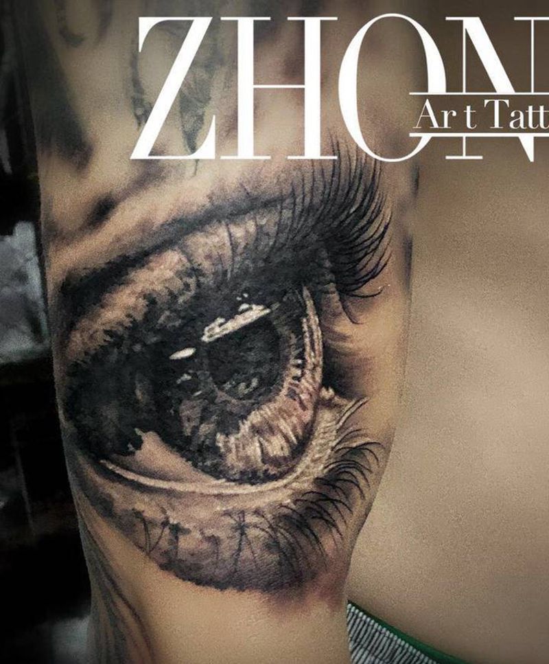 眼睛纹身图片_手臂欧美写实纹身图案