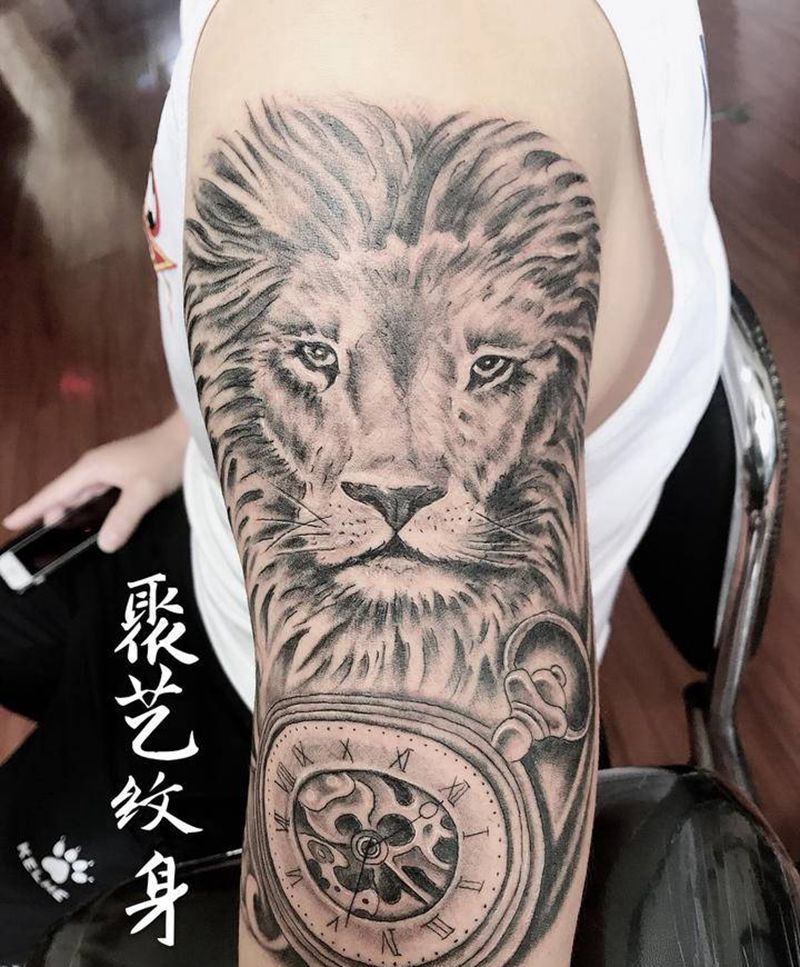 时钟狮子头纹身图片_手臂纹身图案