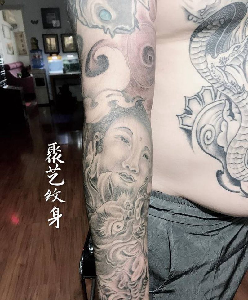 接如来花臂纹身图片_手臂纹身图案