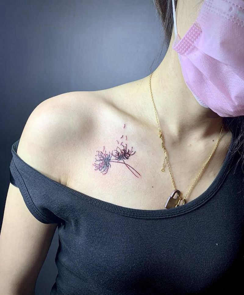 锁骨彼岸花纹身图片_胸部彼岸花锁骨纹身图案