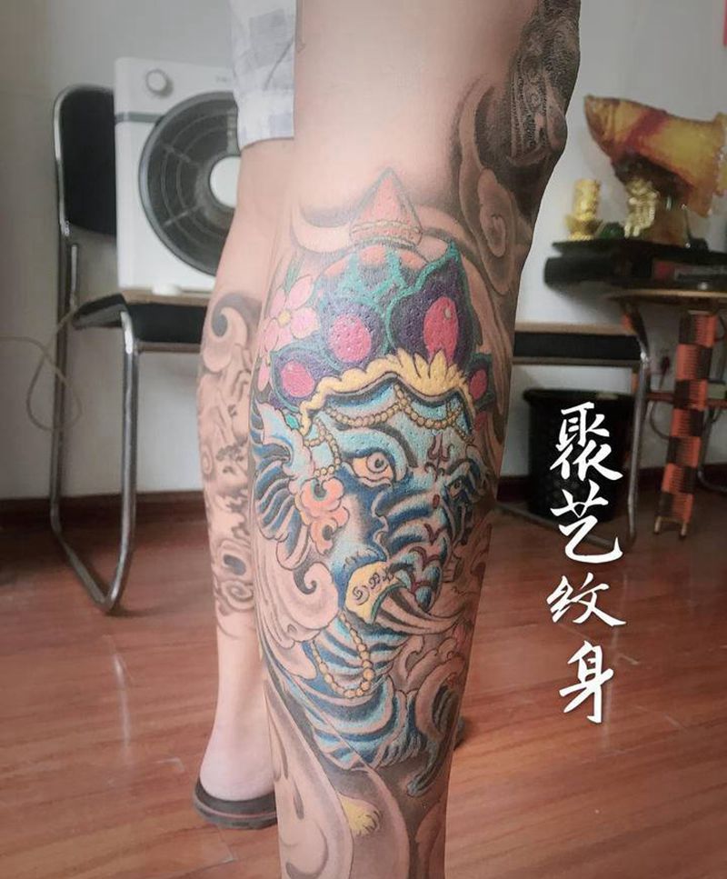 包腿彩色象神莲花纹身图片_腿部纹身图案