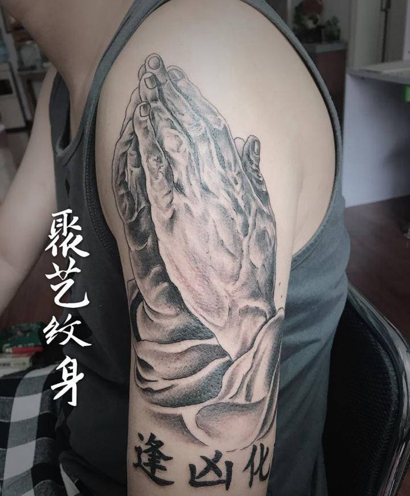 朝拜逢凶化吉纹身图片_手臂纹身图案