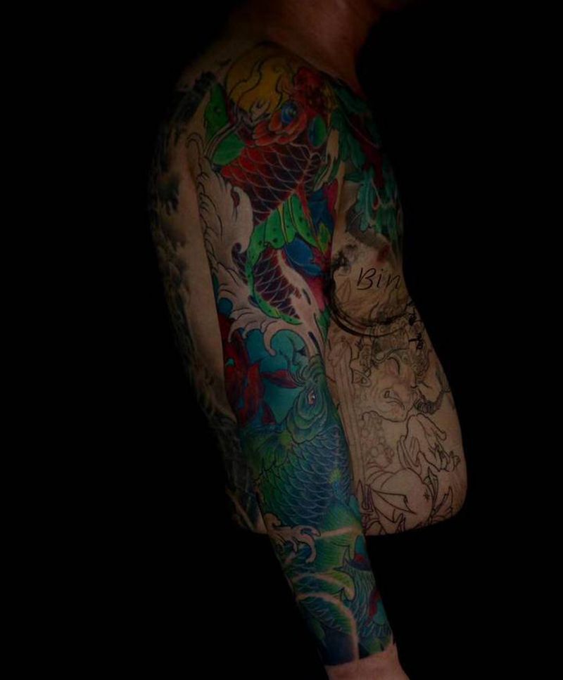 花臂鲤鱼纹身图片_手臂纹身图案