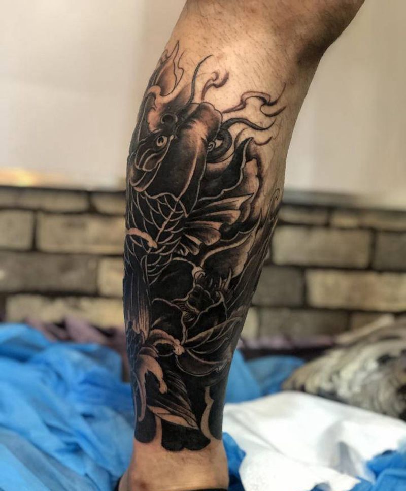 小腿鱼纹身图片_腿部新传统纹身图案