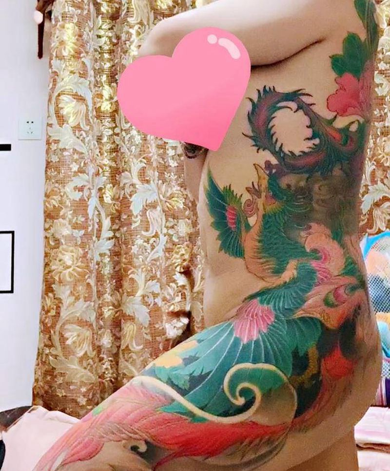 凤戏牡丹纹身图片_臀部背部新传统老传统纹身图案