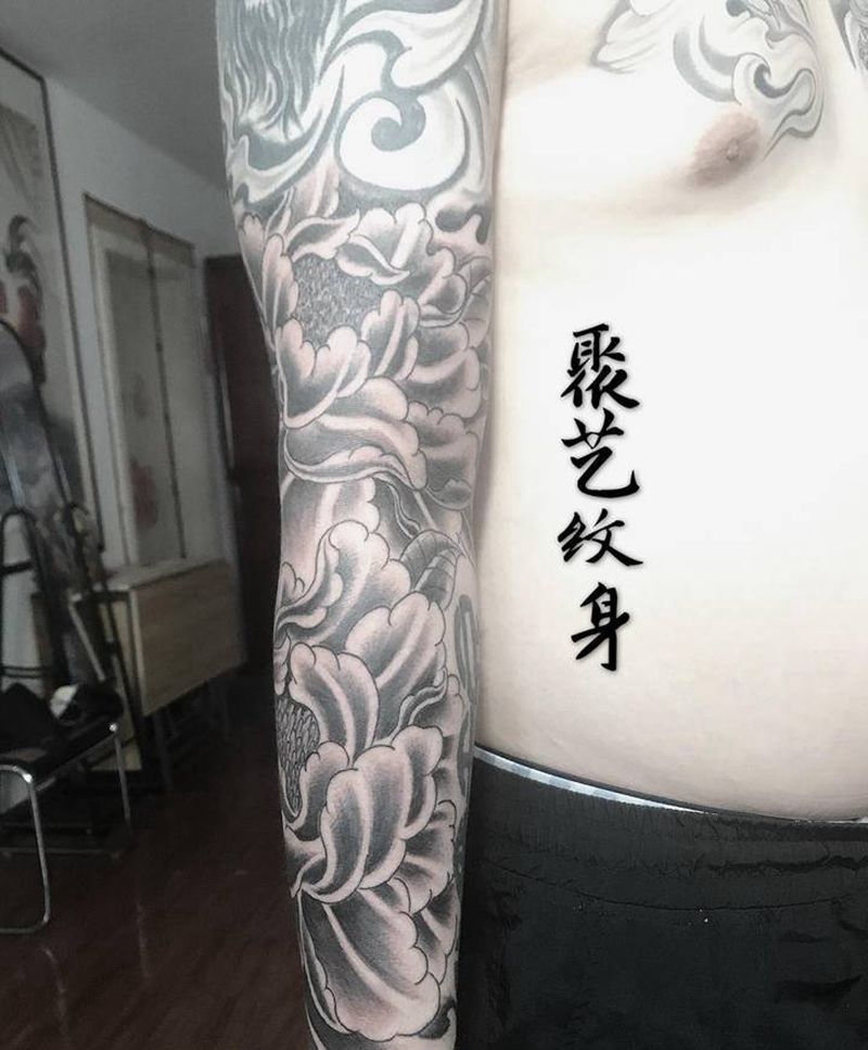 接牡丹花臂纹身图片_手臂纹身图案