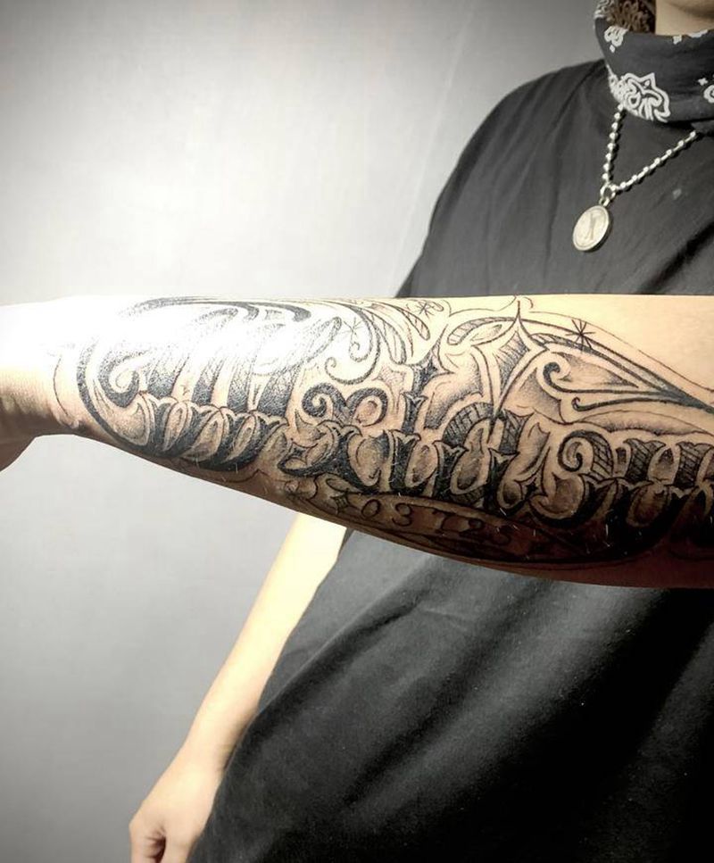 奇卡诺花体字纹身图片_手臂花体字奇卡诺小臂外侧花体字纹身图案