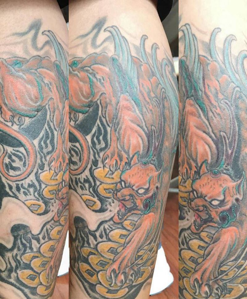 招财貔貅纹身图片_腿部纹身图案