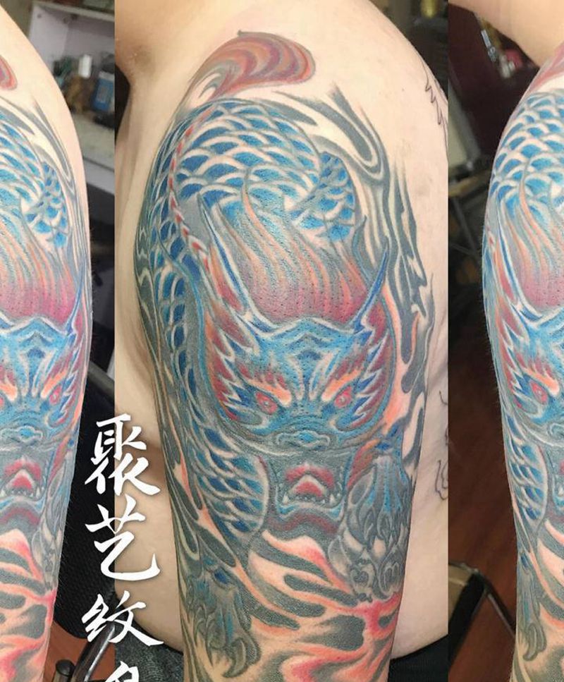 老旧纹身添加彩色麒麟纹身图片_手臂纹身图案