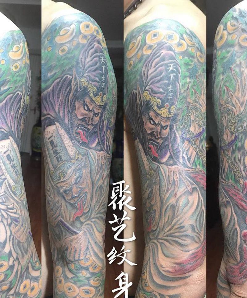 一见发财黑白无常纹身图片_手臂纹身图案