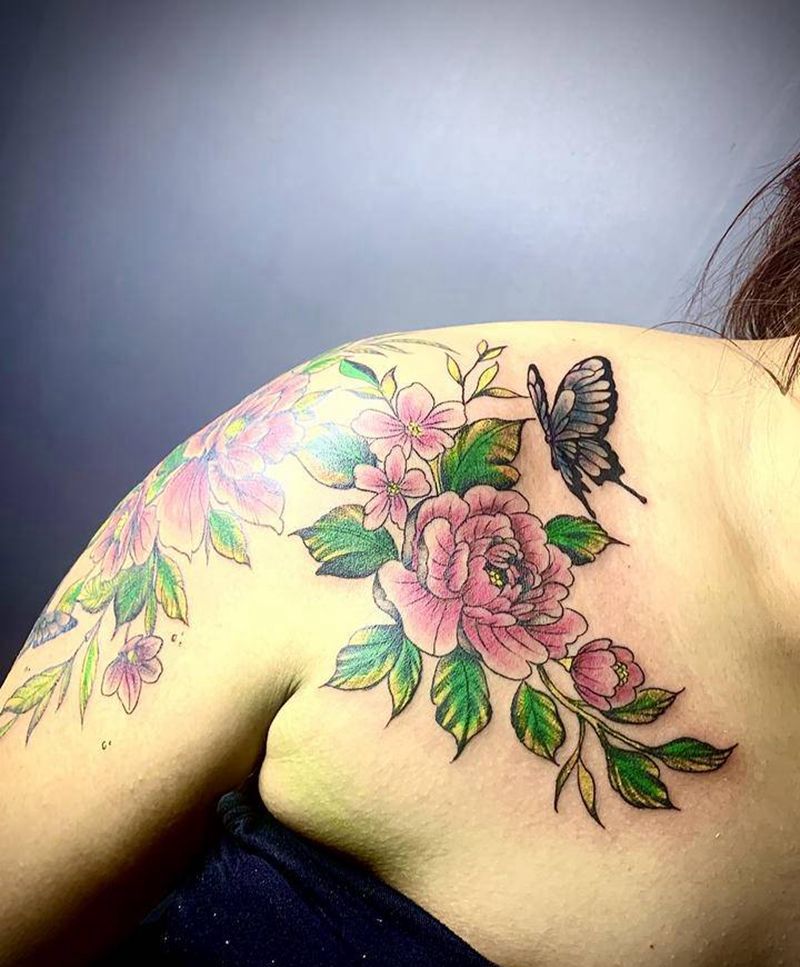 大臂接锁骨彩色素花纹身图片_手臂胸部水彩花纹身图案