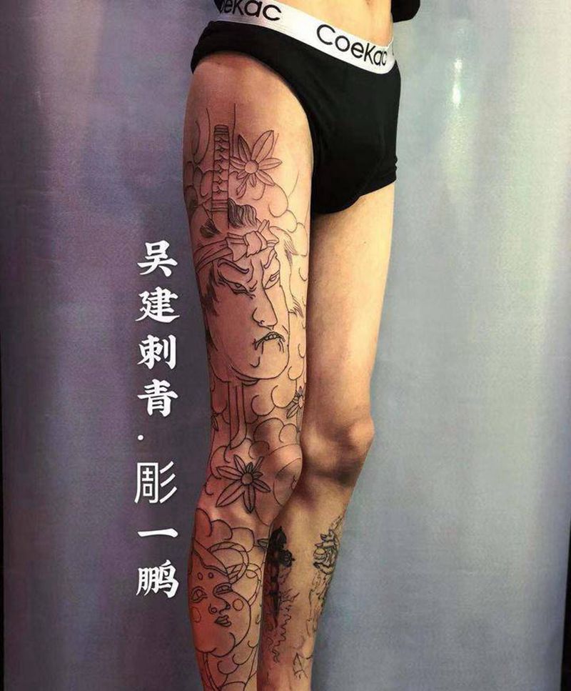 生手阿多福纹身图片_腿部老传统纹身图案